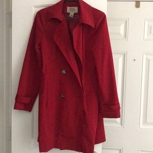 Red long double breasted trench coat, with belt.